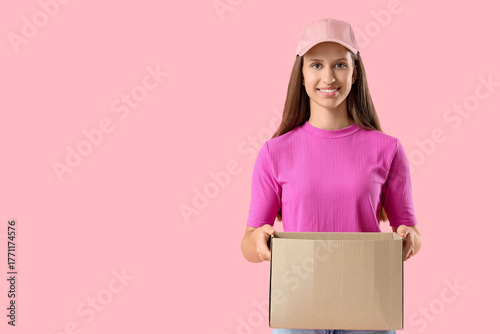 Young woman with cardboard ...