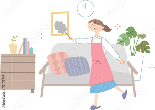 リビングの掃除をする女性