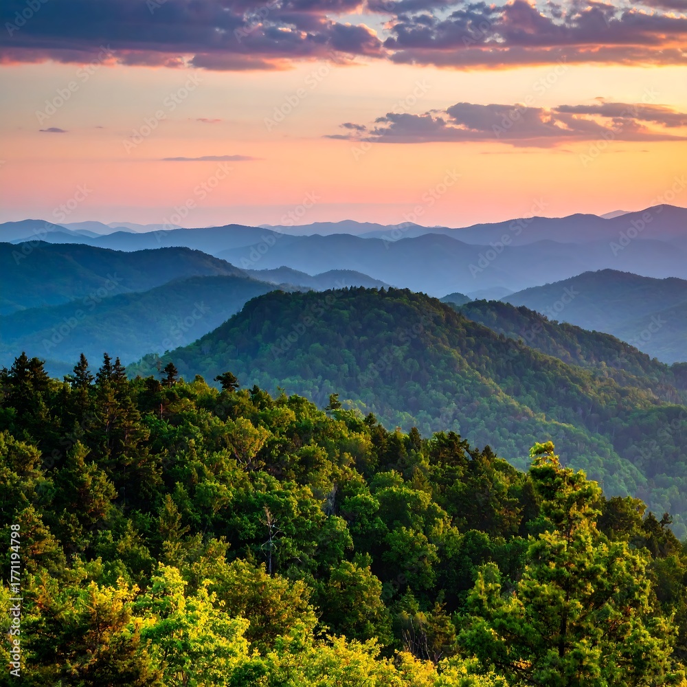 Obraz premium A breathtaking vista of layered mountain ridges under a colorful sunset