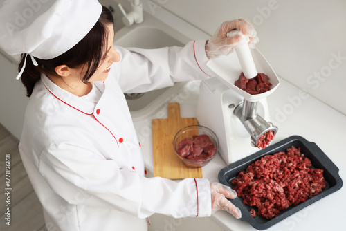 Professional chef grinding ...