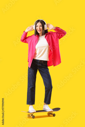 Young woman in headphones w...