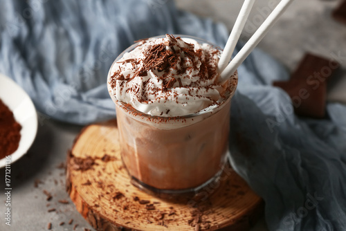 Glass of cold cocoa drink w...