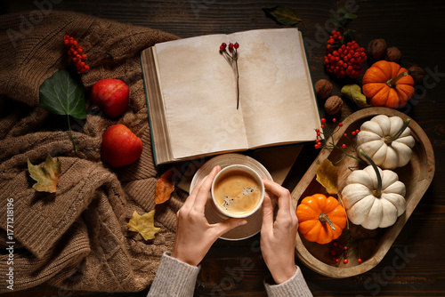 Female hands with mug of ta...