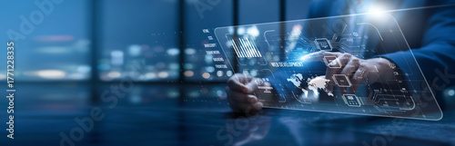 Web Development. Developer using modern interface designing responsive web solutions. Dynamic websites connect businesses, enhance engagement, streamline communication, and improve online experiences.