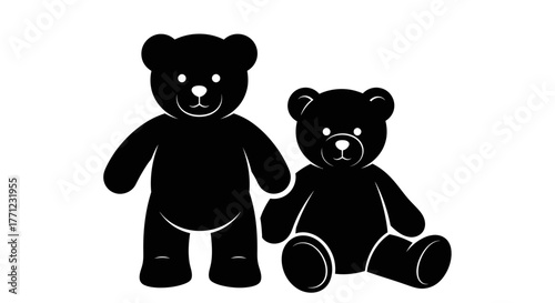 Two adorable black teddy bears standing and sitting together for children's playtime memories isolated on white background