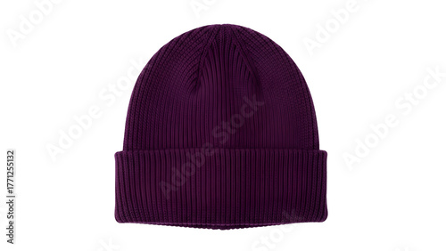 Knitted deep purple skullcap rests against a solid black background