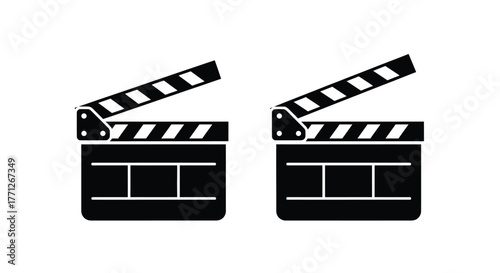 Two black and white clapperboards are prominently displayed in this image