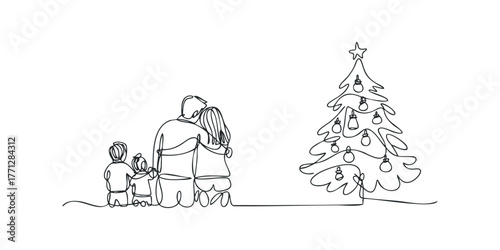Family embraces near festive Christmas tree