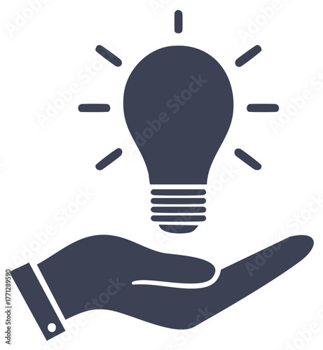 Hand holding a glowing lightbulb symbol of idea and innovation.