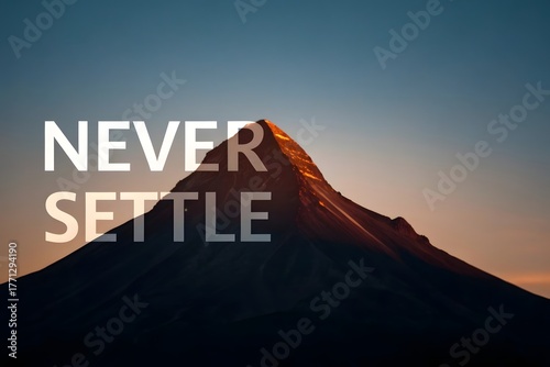 Mountain peak in sunlight with Never Settle quote