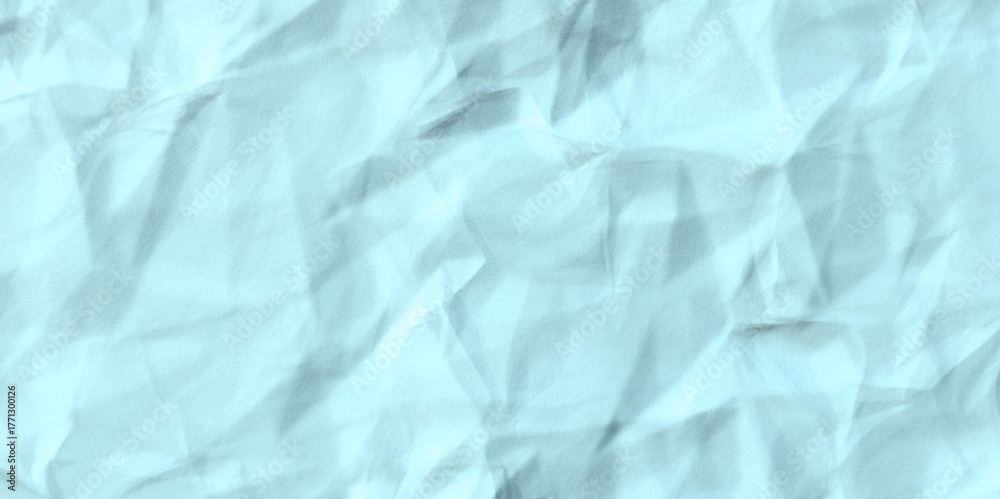 Fototapeta premium Pale Blue Wrinkled Fabric Texture with Soft Folds and Gentle Shadows image photo