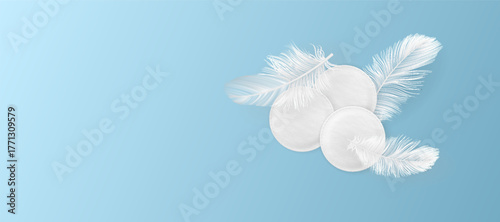 Cosmetic cotton pad disks with feathers on blue gradient background, vector realistic white round pad, sponge discs
