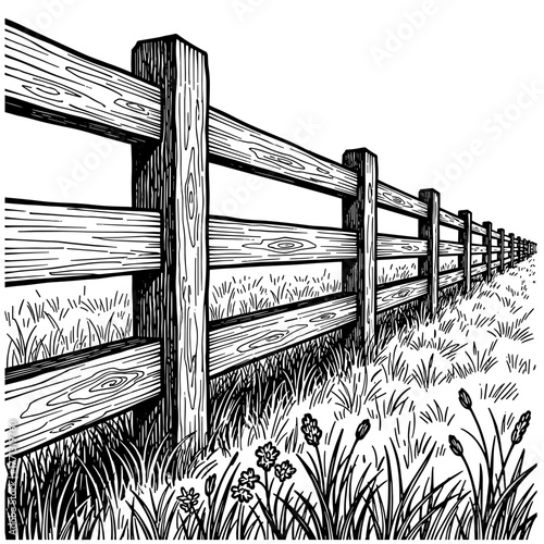 Wooden fence in grassy field in black and white style