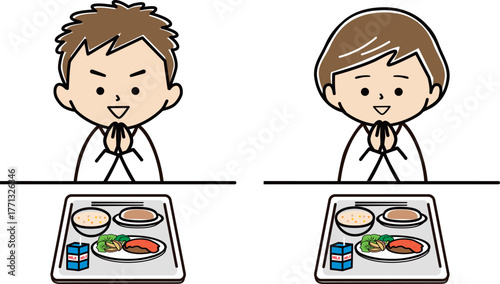 給食を前にいただきますをする男の子と女の子