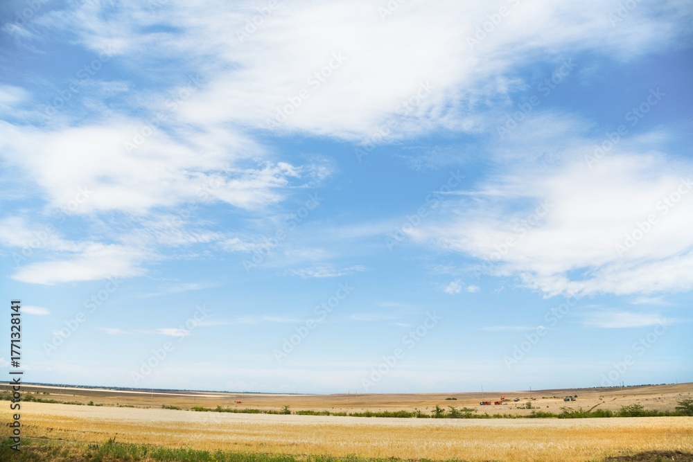 Fototapeta premium Beautiful hilly landscape in the foreground with blue sky