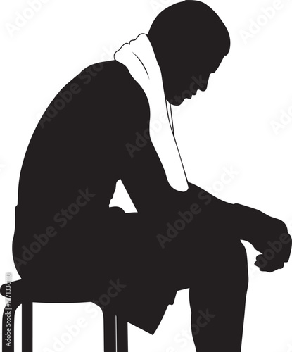 Silhouette of a boxer sitting on a stool with a towel draped around his neck