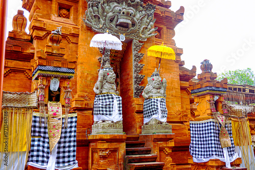 Traditional Balinese Temple Gate with Ornate Architecture and Cultural Symbols