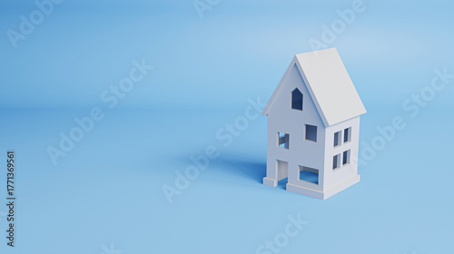 Minimal style house on a blue background with copy space, symbolizing home buying, housing loans, and modern living concepts. 3d rendering