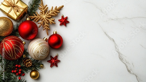 Festive Christmas Decorations with Ornaments and Gifts on Marble