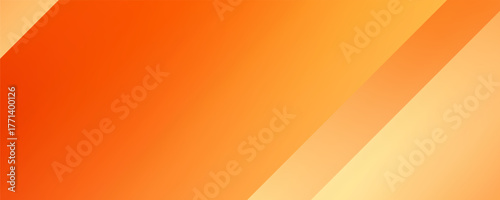 Warm orange yellow red gradient background. Autumn colored blurred wallpaper.