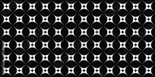 Intricate black and white pattern featuring interconnected circles and diamond shapes creating a visually appealing design