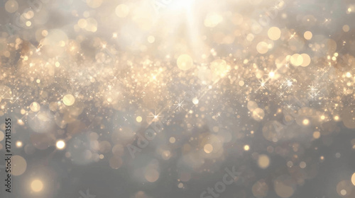 Abstract background featuring shimmering golden bokeh lights and a radiant sunburst effect, creating a dreamy and festive atmosphere.