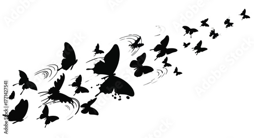 A dynamic swarm of black butterflies takes flight, symbolizing freedom and transformation.
