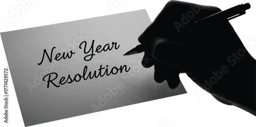 Hand writing new year resolution a paper isolated concept of setting goals and making plans for upcoming year