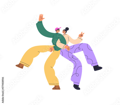 Couple dancing together with fun, excited emotions. Happy young best friends,...