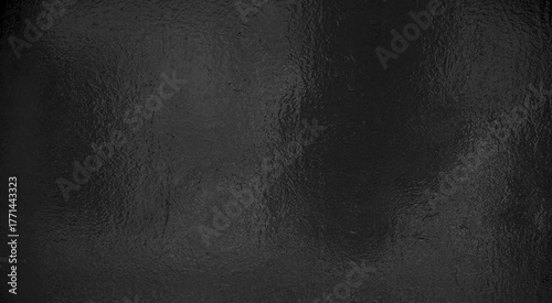 Metalloberfläche in schwarz mit Licht Reflektion
