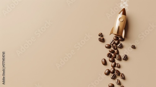 Creative coffee concept: rocket launch with coffee bean trail on beige background