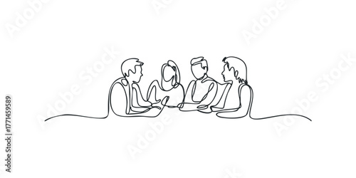 Group of four people in casual conversation around a table