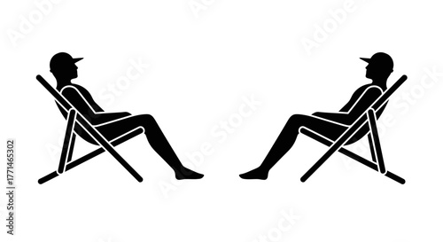 Two men silhouetted relaxing in folding chairs facing each other
