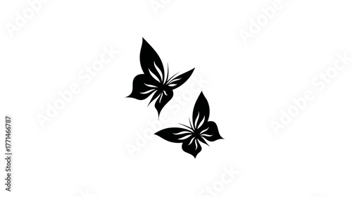 Two stylized black butterflies with intricate wing designs on a clean, white background