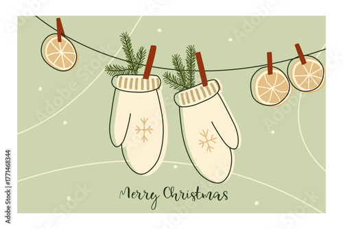Winter holiday illustration, mittens and orange slices hanging on a rope