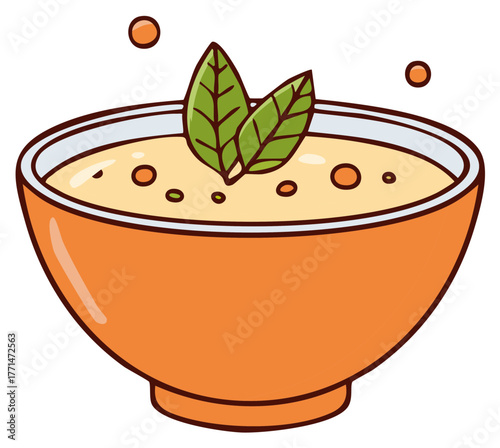 Healthy Creamy Soup in Orange Bowl with Fresh Mint Leaves and Bubbles