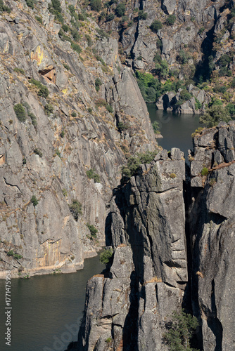 Majestic Rocky Canyon with Serene River View