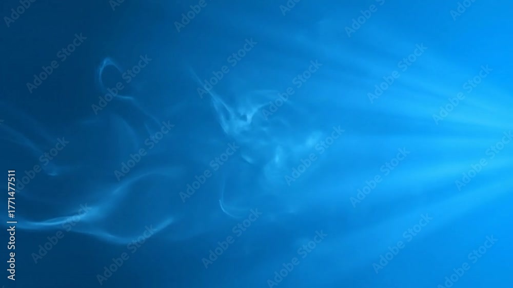 Abstract blue background featuring smoke/vapor with light rays radiating from the right
