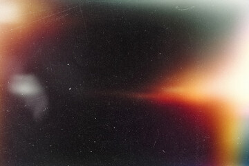 light leak overlay effect with scratch dust and blur orange light leaks,retro noisy film texture light leak flare on black background,abstract background with ray light,grunge old film burn background