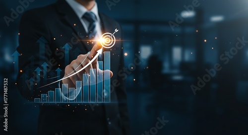 Man in a suit interacts with a futuristic interface showing a bar graph and upward arrow, symbolizing profit, data analysis, and reaching targets