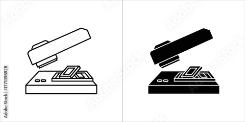 Two icons of a stapler, one outlined and one solid black, presented side by side on a