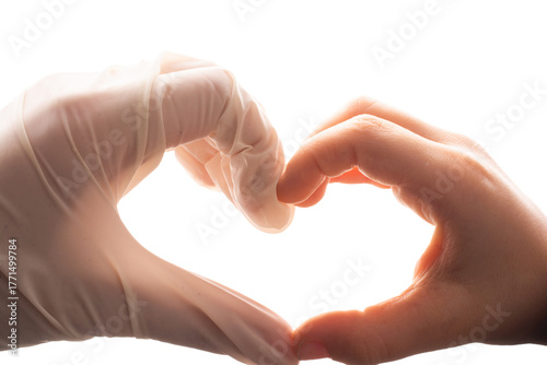 The shape of love heart formed by hand. on white background.