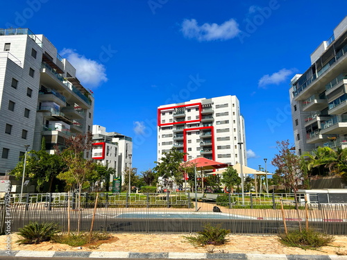A modern residential area in Israel. New buildings, a cozy residential complex. Apartment buildings