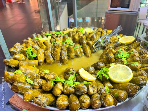 Ale Gefen, stuffed grape (vine) leaves is the Israeli Galilean signature dish. Alei gefen, Sarma Dolma with lemon