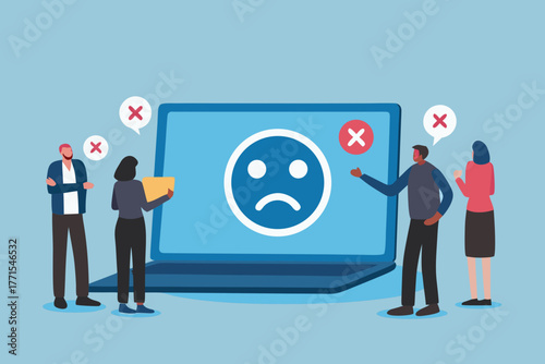 Diverse team members react negatively to a sad face emoji displayed on a laptop screen with red cross icons
