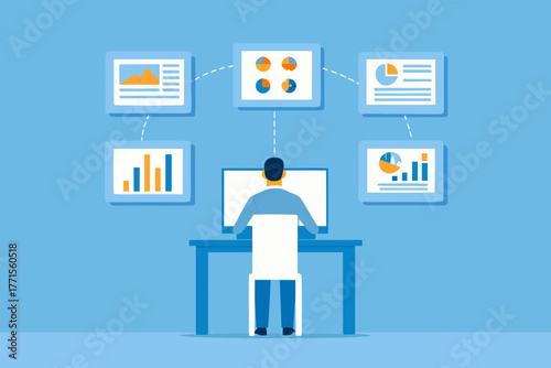 Business analyst working at a desk with multiple data charts and graphs displayed on screens around them
