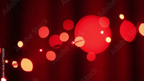 Magical red bokeh lights create a festive and warm atmosphere, perfect for celebrations.