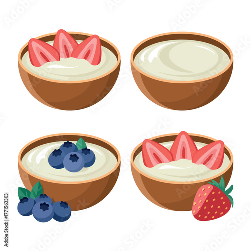 Four bowls of yogurt with fresh strawberries and blueberries