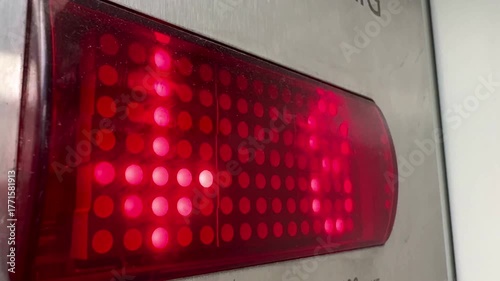 Electronic red elevator floor indicator shows the floor counter from 9 to 1 floor. High 4 k quality