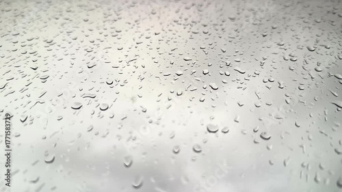 Raindrops on the window, rain in the city, cloudy weather, wet window after rain. High 4k quality